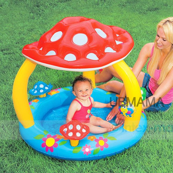 children at the bottom of an inflatable swimming pool with baby mushroom awning pool sea basin
children at the bottom of an inflatable swimming pool with baby mushroom awning pool sea basin