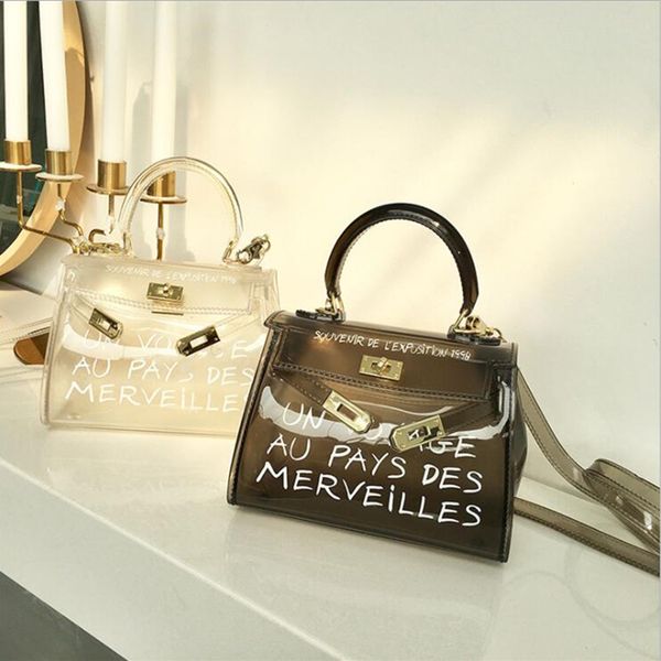 bolsas feminina продажа сумки новый +2018 прозрачными прозрачный jelly сумка цвет письмо на ремне сумки
bolsas feminina продажа сумки новый +2018 прозрачными прозрачный jelly сумка цвет письмо на ремне сумки