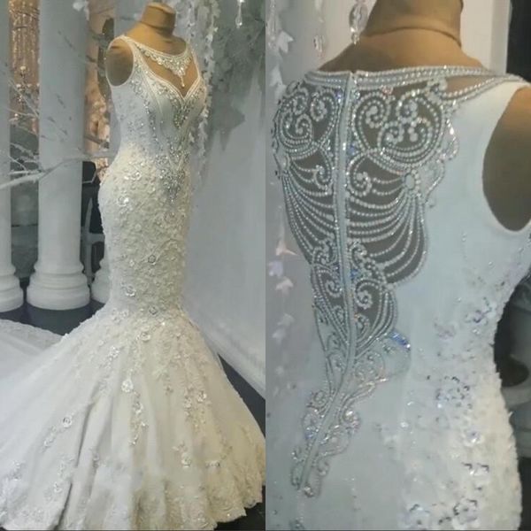 2019 Mermaid Wedding Dresses Sheer Neckline Lace Appliques Beaded Illusion See Through Tulle Long Train Bridal Gowns
2019 Mermaid Wedding Dresses Sheer Neckline Lace Appliques Beaded Illusion See Through Tulle Long Train Bridal Gowns
