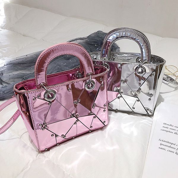 laser women handbags dazzle color tote casual bags female fashion rivet patchwork handbags lady patent leather mirror bag 
laser women handbags dazzle color tote casual bags female fashion rivet patchwork handbags lady patent leather mirror bag