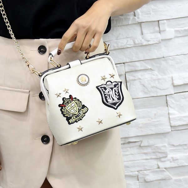 vintage fashion new female messenger handbags pu leather women bag retro badge crossbody tote rivet shoulder bags
vintage fashion new female messenger handbags pu leather women bag retro badge crossbody tote rivet shoulder bags