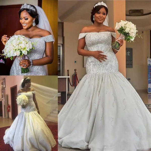 2019 White Luxury African Mermaid Wedding Dresses Trumpet Lace Tulle Applique Plus Size Bridal Gowns Sweep Train Beaded Wedding Dress
2019 White Luxury African Mermaid Wedding Dresses Trumpet Lace Tulle Applique Plus Size Bridal Gowns Sweep Train Beaded Wedding Dress