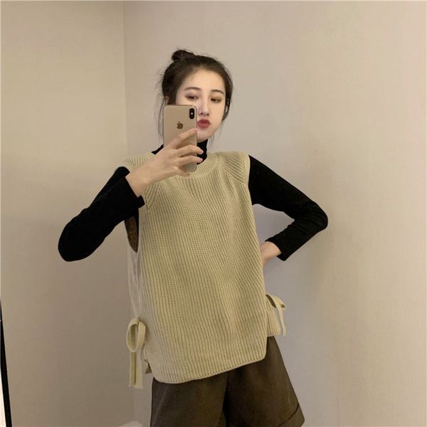 women's pullover o-neck knit vest design side lace up student knit vest autumn korean new loose short sleeveless sweater ml182, Black;white
women's pullover o-neck knit vest design side lace up student knit vest autumn korean new loose short sleeveless sweater ml182, Black;white