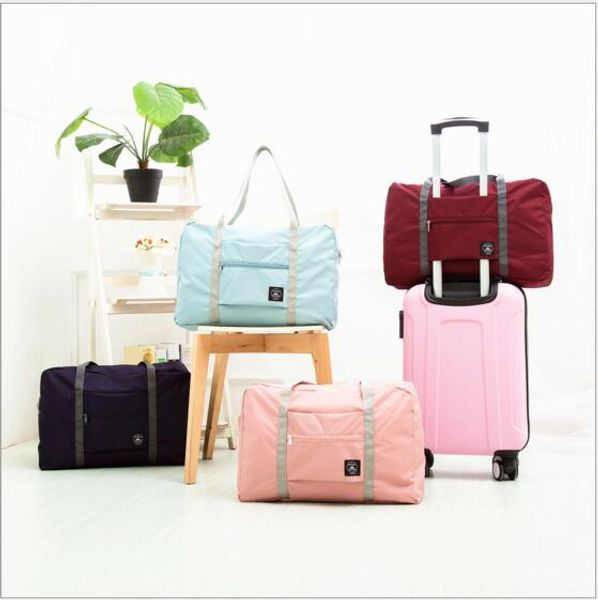 folding travel storage bag carry-on hand luggage organizer tote large foldable shoulder duffel handbags men women 5 colors ccfyz160 
folding travel storage bag carry-on hand luggage organizer tote large foldable shoulder duffel handbags men women 5 colors ccfyz160