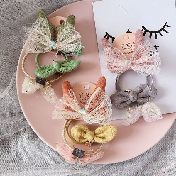3pcs / set2020 spring and summer new elastic band yarn bow lace small ear hair accessories, Slivery;white 
3pcs / set2020 spring and summer new elastic band yarn bow lace small ear hair accessories, Slivery;white