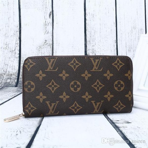 Aaa fa hion zipper pur e good quality leather men women hand pur e luxury brand de igner wallet multi color optional wallet
Aaa fa hion zipper pur e good quality leather men women hand pur e luxury brand de igner wallet multi color optional wallet