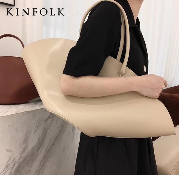 est brand high-quality ladies handbag scalloped shell fashion design big easy shopping bag mother bag armpit shoulder bag banquet to wor 
est brand high-quality ladies handbag scalloped shell fashion design big easy shopping bag mother bag armpit shoulder bag banquet to wor
