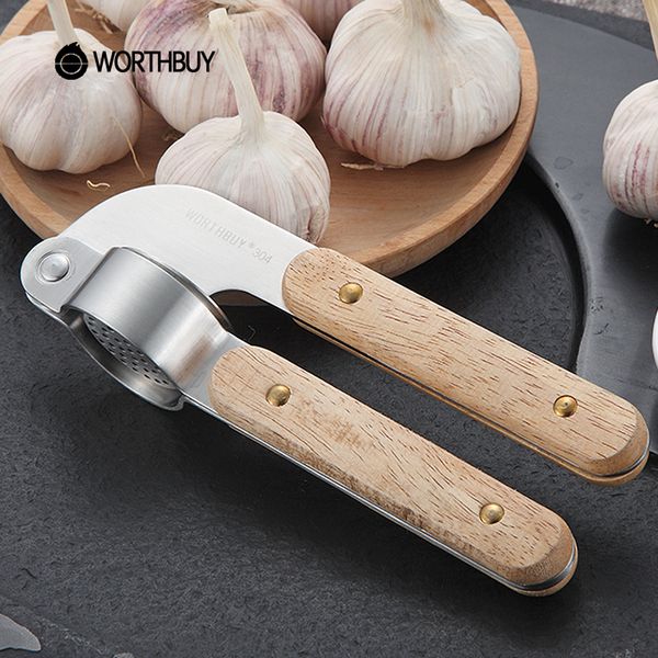 new design 304 stainless steel garlic presses slicer rubber wooden handle garlic crusher fruit vegetable tools kitchen accessories
new design 304 stainless steel garlic presses slicer rubber wooden handle garlic crusher fruit vegetable tools kitchen accessories