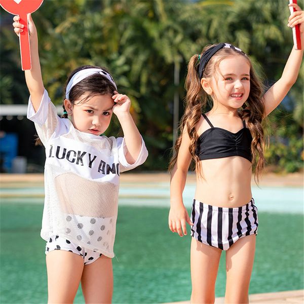 tree pieces bikini girls dot print swimsuit white children swimwear kid letter print swim suit child ruffle bathing suit beach
tree pieces bikini girls dot print swimsuit white children swimwear kid letter print swim suit child ruffle bathing suit beach
