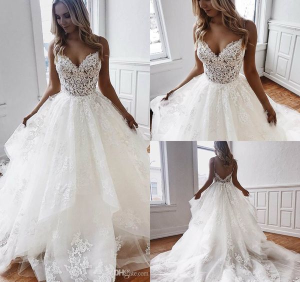 elegant beach wedding dresses a-line spaghetti straps lace bridal gowns appliques beading tiered skirt backless vestidos de novia, White
elegant beach wedding dresses a-line spaghetti straps lace bridal gowns appliques beading tiered skirt backless vestidos de novia, White