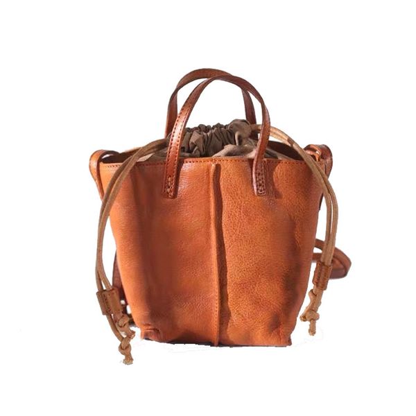 japanese style retro national wind leather drawstring bucket bag vegetable tanned cowhide handbag casual bag ing
japanese style retro national wind leather drawstring bucket bag vegetable tanned cowhide handbag casual bag ing
