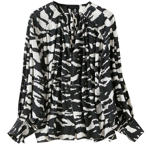 woman black white zebra print silk oversized v-neck with ties long sleeves fashion blouse pleats detail
woman black white zebra print silk oversized v-neck with ties long sleeves fashion blouse pleats detail