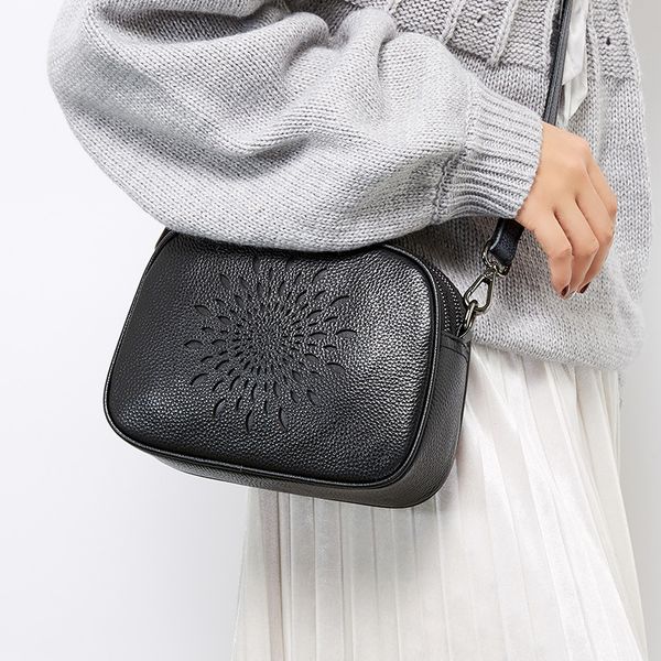 new messenger bag women's baotou head layer cowhide soft face hollow fashion small round bag wild
new messenger bag women's baotou head layer cowhide soft face hollow fashion small round bag wild