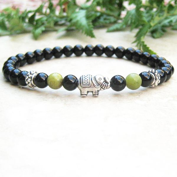 wholesale 4 mm men's woman's black onyx bracelet african jades good luck bracelet elephant charm yoga energy, Golden;silver
wholesale 4 mm men's woman's black onyx bracelet african jades good luck bracelet elephant charm yoga energy, Golden;silver