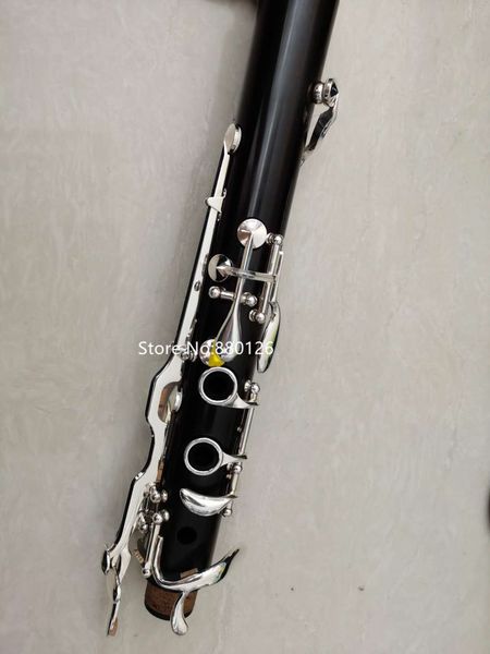selling clarinet 18 keys g tune ebony wood black silver key musical instrument with case ng
selling clarinet 18 keys g tune ebony wood black silver key musical instrument with case ng