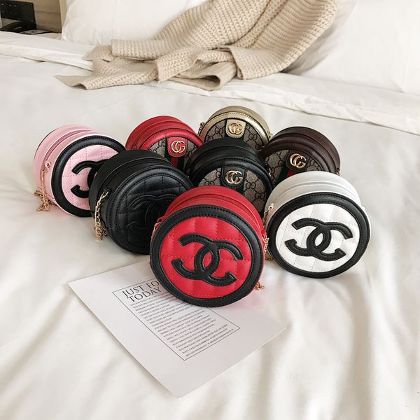 Kid de igner round bag 2019 baby girl fa hion handbag children contra t color me enger bag girl acce orie 
Kid de igner round bag 2019 baby girl fa hion handbag children contra t color me enger bag girl acce orie