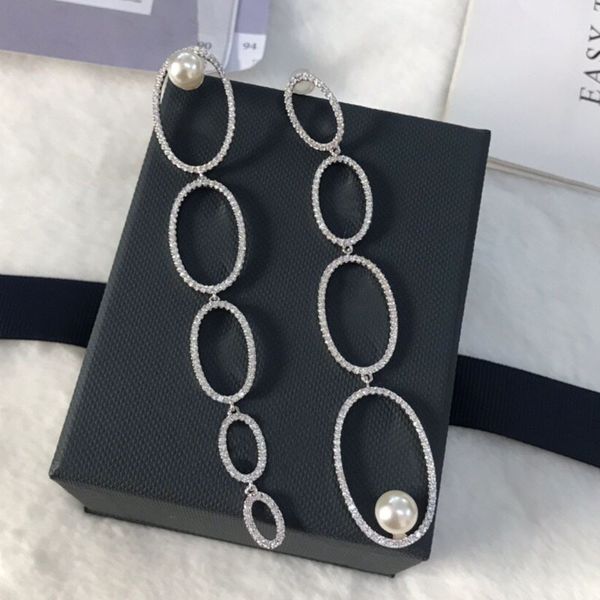 umgodly luxury pure paved zircon stones asymmetric multi circles pearl big long drop earrings for women jewelry, Silver
umgodly luxury pure paved zircon stones asymmetric multi circles pearl big long drop earrings for women jewelry, Silver