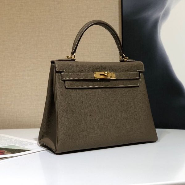 fashion hand-stitched imported german togo calfskin series designer luxury tote bag ladies handbag wallet elephant gray dhl
fashion hand-stitched imported german togo calfskin series designer luxury tote bag ladies handbag wallet elephant gray dhl