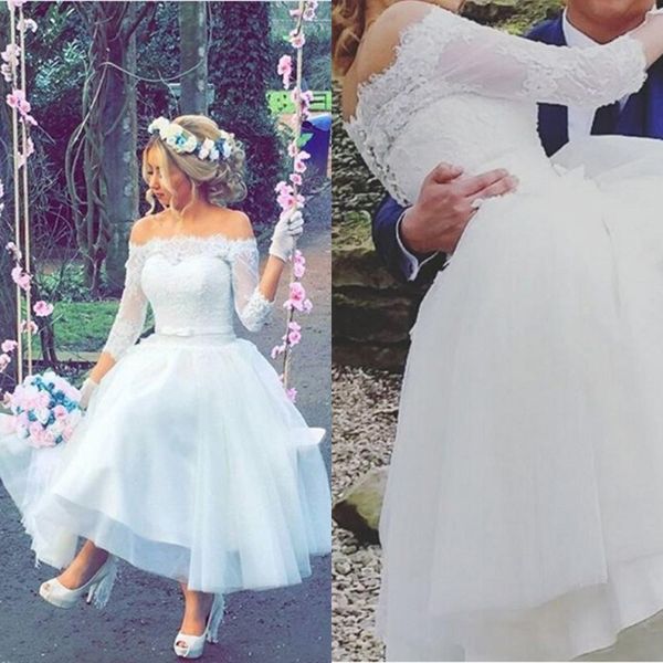 romantic 2020 new short garden beach country wedding dresses off the shoulder lace tulle 3/4 long sleeve tea length bridal gowns
romantic 2020 new short garden beach country wedding dresses off the shoulder lace tulle 3/4 long sleeve tea length bridal gowns