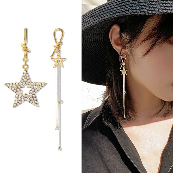 2019 new diamond studded five pointed star metal knot asymmetric earrings super immortal personality and versatile earrings, Golden;silver
2019 new diamond studded five pointed star metal knot asymmetric earrings super immortal personality and versatile earrings, Golden;silver