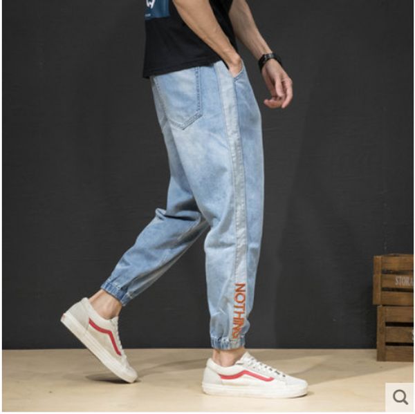 light blue men jeans are loose elastic charge leg beam foot trousers youth popular logo haroun pants
light blue men jeans are loose elastic charge leg beam foot trousers youth popular logo haroun pants
