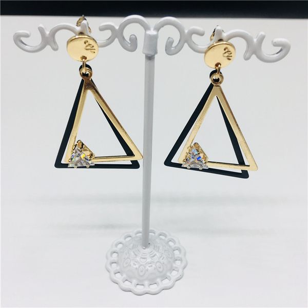 anti-allergic earpiece hollow triangular earrings; fashionable geometric zirconium earnail; european and american temperament earrings, Silver
anti-allergic earpiece hollow triangular earrings; fashionable geometric zirconium earnail; european and american temperament earrings, Silver
