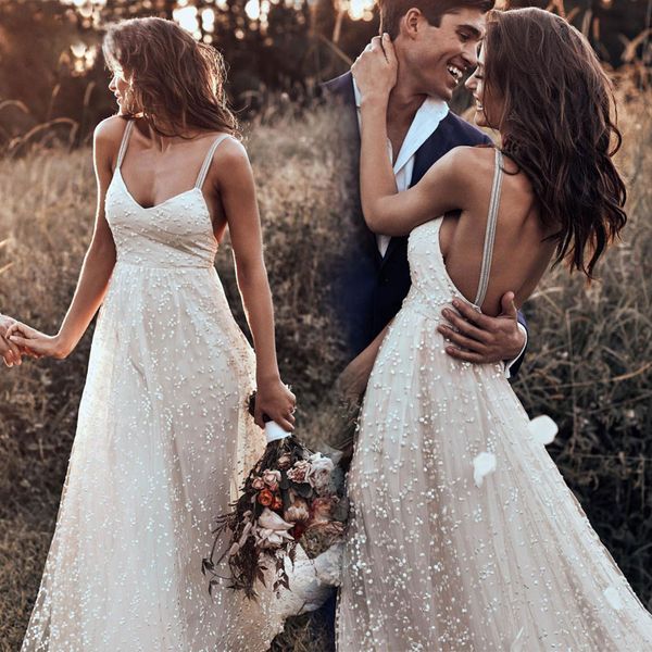 charming bohemian backless wedding dresses spaghetti straps beach bridal gowns dot tulle a line sweep train boho vestido de novia, White
charming bohemian backless wedding dresses spaghetti straps beach bridal gowns dot tulle a line sweep train boho vestido de novia, White