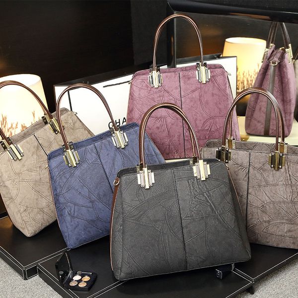fashion bag handbag splicing vintage single shoulder leather women's bag middle aged women messenger
fashion bag handbag splicing vintage single shoulder leather women's bag middle aged women messenger