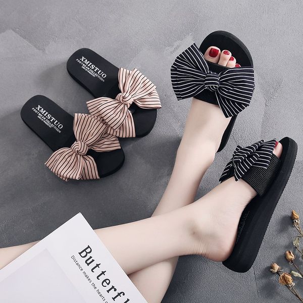 new wear sandals and slippers female summer bow thick bottom word drag fashion korean version of the beach non-slip beach shoes, Black
new wear sandals and slippers female summer bow thick bottom word drag fashion korean version of the beach non-slip beach shoes, Black