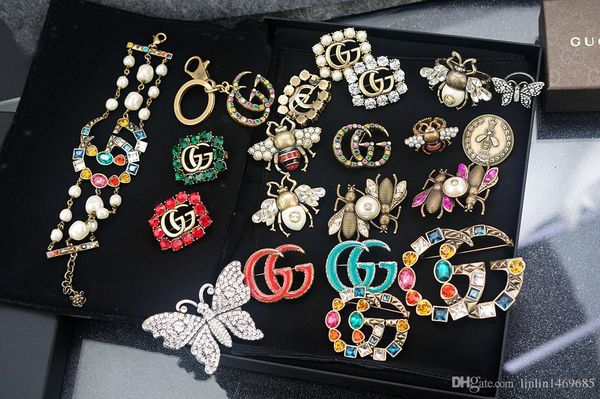 celebrity design letter pearl diamond brooch decorations fashion metal letter bee brooch jewelry with box, Gray
celebrity design letter pearl diamond brooch decorations fashion metal letter bee brooch jewelry with box, Gray