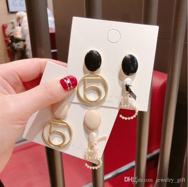 new wholesale fashion asymmetric 5th pendant earrings pearl letter earrings ladies and women's party jewelry gift accessories, Silver
new wholesale fashion asymmetric 5th pendant earrings pearl letter earrings ladies and women's party jewelry gift accessories, Silver