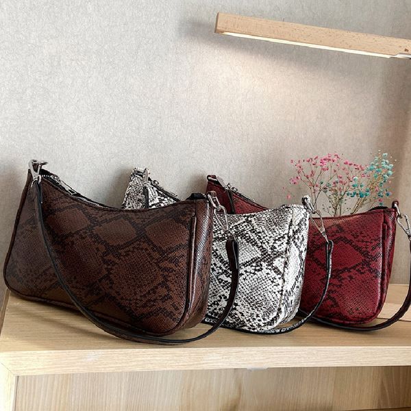 2019 new snake pattern shoulder bag luxury handbag women bags designer personality wild pu leather small handbags bolsa feminina
2019 new snake pattern shoulder bag luxury handbag women bags designer personality wild pu leather small handbags bolsa feminina