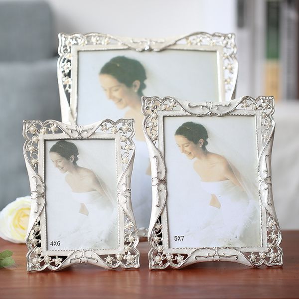 european vintage shiny silver plating with white hand enameled and pearls jeweled metal p frame for 4x6,5x7,8x10 inch paper
european vintage shiny silver plating with white hand enameled and pearls jeweled metal p frame for 4x6,5x7,8x10 inch paper
