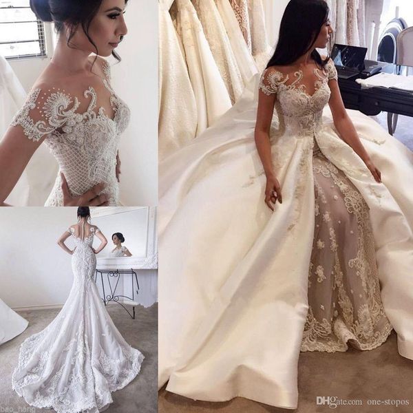 2020 applique luxurious mermaid wedding dresses with detachable train pearls beaded jewel short sleeves bridal gowns, White
2020 applique luxurious mermaid wedding dresses with detachable train pearls beaded jewel short sleeves bridal gowns, White