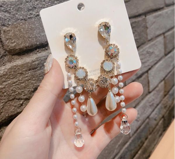 silver needle temperament pearl crystal tassel long earrings women rhinestone evening dinner party ear accessories
silver needle temperament pearl crystal tassel long earrings women rhinestone evening dinner party ear accessories