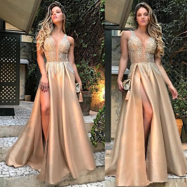2020 arabic aso ebi gold luxury a line evening dresses beaded crystals prom dresses high split formal party gown robes de soiree, Black;red 
2020 arabic aso ebi gold luxury a line evening dresses beaded crystals prom dresses high split formal party gown robes de soiree, Black;red