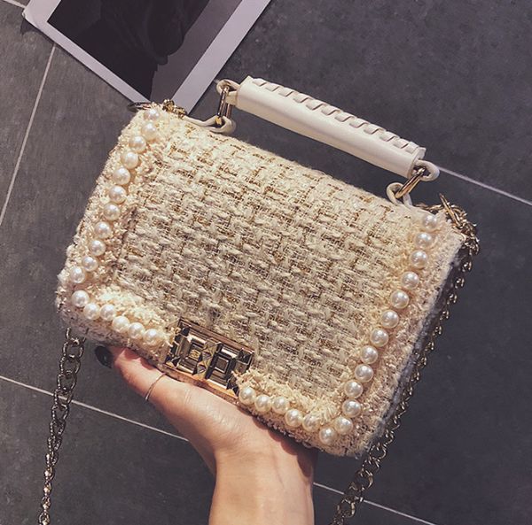 дизайнерские новые женские цепи простой сумка-мессенджер pearl trend большой емкости сумка леди зимняя шерстяная сумочка
дизайнерские новые женские цепи простой сумка-мессенджер pearl trend большой емкости сумка леди зимняя шерстяная сумочка