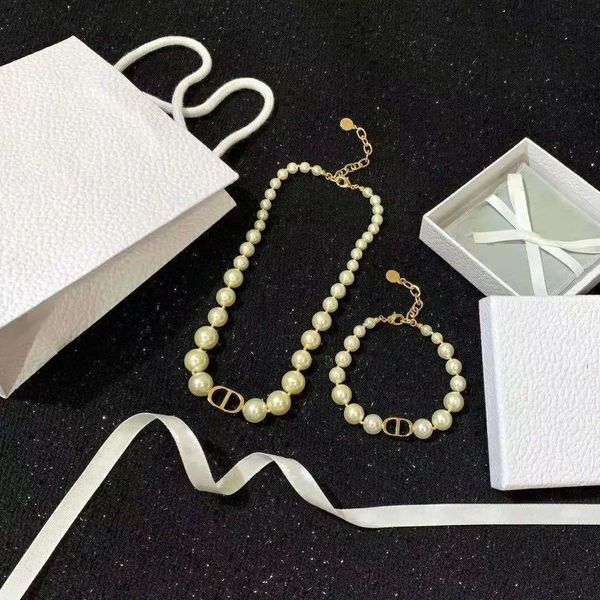 selling classic letter pearl wild fashion jewelry set womens pearl necklace pearl bracelet, Silver
selling classic letter pearl wild fashion jewelry set womens pearl necklace pearl bracelet, Silver