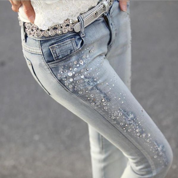 2020 spring new women jeans beading rhinestones plus size slim feet pencil pants jeans women denim trousers w200, Blue
2020 spring new women jeans beading rhinestones plus size slim feet pencil pants jeans women denim trousers w200, Blue