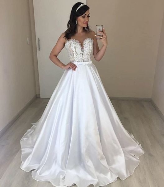 illusion o-neck white wedding dresses lace beaded charming church wedding gowns see though back bride wedding party wear
illusion o-neck white wedding dresses lace beaded charming church wedding gowns see though back bride wedding party wear