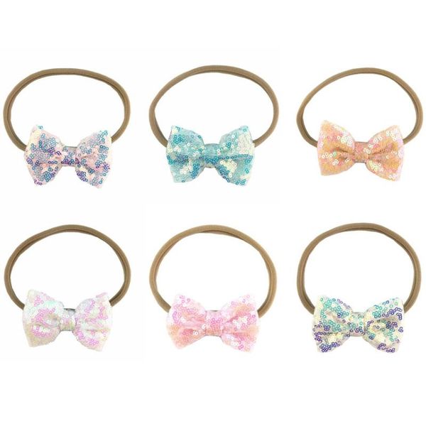 36pc/lot girls 3inch glitter sequin bow with nylon headbands kids soft nylon elastic headband,children girl's headwear, Slivery;white
36pc/lot girls 3inch glitter sequin bow with nylon headbands kids soft nylon elastic headband,children girl's headwear, Slivery;white