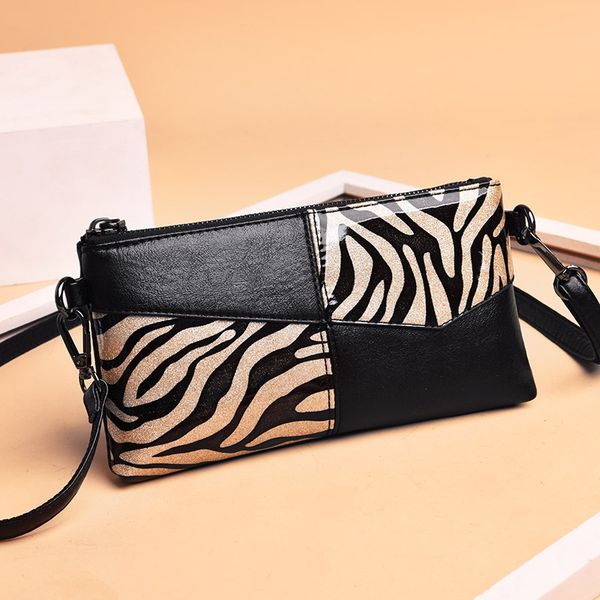 new ladies shoulder bag pu patent leather clutch bag soft leather fashionable messenger zebra pattern handbag
new ladies shoulder bag pu patent leather clutch bag soft leather fashionable messenger zebra pattern handbag