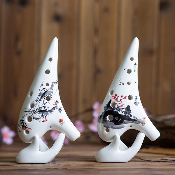 tao alto flute wholesale 12 hole c hand-painted glaze professional ocarina intonation sound good for the shop to learn
tao alto flute wholesale 12 hole c hand-painted glaze professional ocarina intonation sound good for the shop to learn