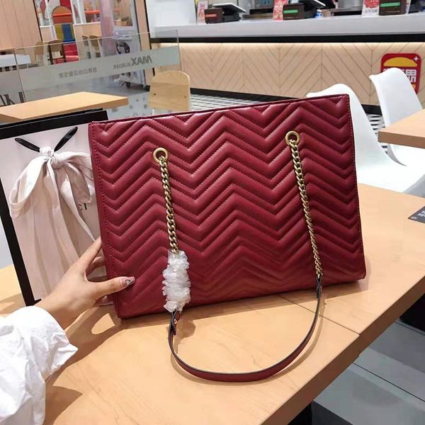 the new one shoulder bags inclined shoulder genuine leather handbag chain super capacity joker single shoulder bag designer handbags tote
the new one shoulder bags inclined shoulder genuine leather handbag chain super capacity joker single shoulder bag designer handbags tote