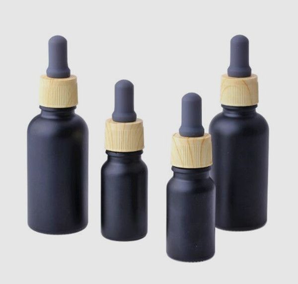 E liquid e juice Essential oil bottle 30ml Luxury wood grain lid black matte glass dropper bottle 1 oz frosted essential oil custom
E liquid e juice Essential oil bottle 30ml Luxury wood grain lid black matte glass dropper bottle 1 oz frosted essential oil custom