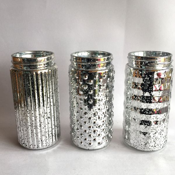 new6inch tall wedding glass mercury mason jars flower vase or candle holder in silver,3 style asst. 3pcs/lot usd19.50/lot
new6inch tall wedding glass mercury mason jars flower vase or candle holder in silver,3 style asst. 3pcs/lot usd19.50/lot