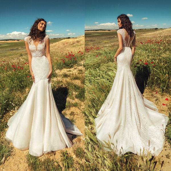 mermaid wedding dresses deep v neck capped sleeves applique lace wedding dress button back sweep train bridal gowns robe de mariée, White
mermaid wedding dresses deep v neck capped sleeves applique lace wedding dress button back sweep train bridal gowns robe de mariée, White