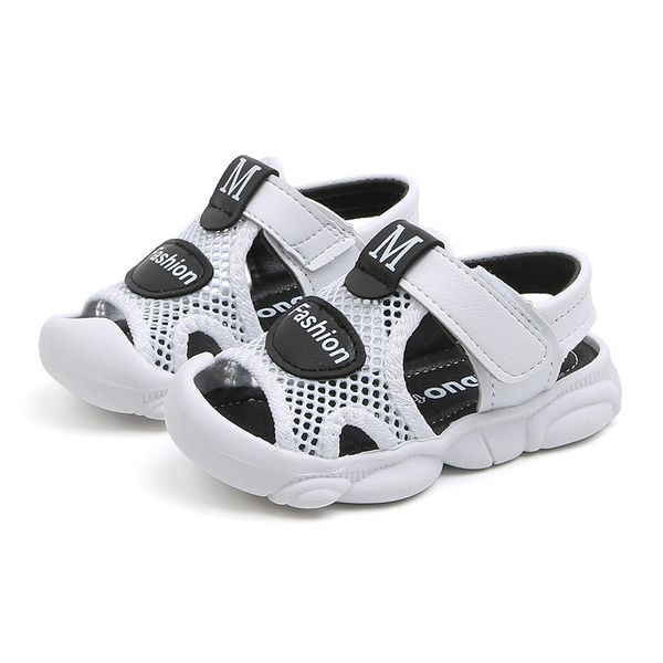 flat shoes 2021 summer cartoon children' sandals baotou boys and girls baby soft bottom, Black;grey 
flat shoes 2021 summer cartoon children' sandals baotou boys and girls baby soft bottom, Black;grey