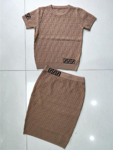 early spring new suit f letter hollow out small round-collar knitted short sleeve mid-long half-length skirt women's wear, White
early spring new suit f letter hollow out small round-collar knitted short sleeve mid-long half-length skirt women's wear, White
