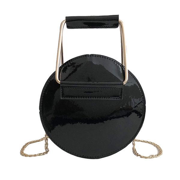 circular glossy pu leather retro metal ring handbag small round women shoulder mini bag black 
circular glossy pu leather retro metal ring handbag small round women shoulder mini bag black